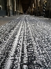 Pascal Dombis - Extra_Vague : Text(e)~Fil(e)s. 2010, Installation in-situ imprimée au sol, Palais Royal, Galerie Valois, Paris, 252 x 130 cm.