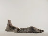 3e Biennale de sculpture d'Yerres - Inventer des mondes singuliers : Jean Anguera. Femme étendue… pensée du paysage. 1999, résine polyester, 53 x 172 x 72 cm. ©Jean Anguera