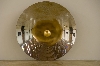 Incandescence : Vladimir Skoda, Galileo-Galilei, 2004-2011 Miroir concave sphérique en acier inox  poli, Diamètre 185 cm x 27 cm, sphère en acier doré, Diamètre 20 cm, mécanisme du mouvement continu Vue de l’exposition « Trou blanc », Carré Sainte-Anne, Montpellier, 2010